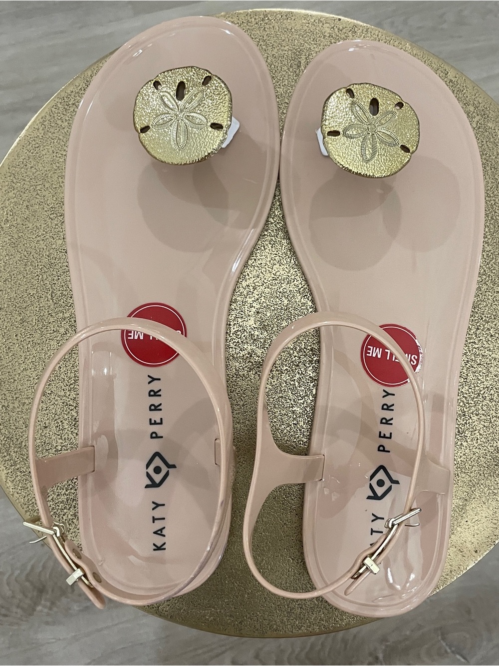 Katy Perry Collections Nude Jelly Sandals with Gold Sand Dollar Accent